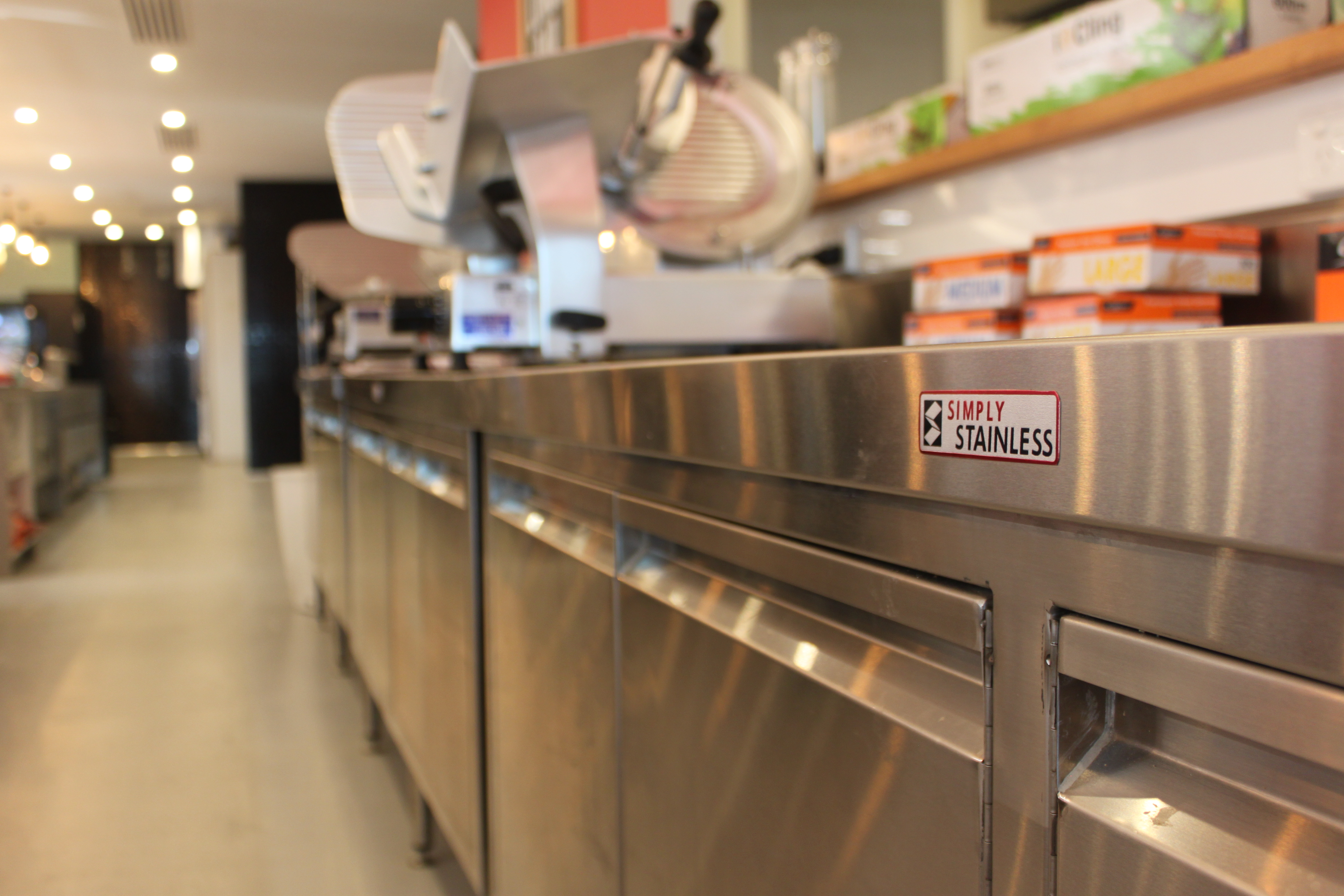 Simply Stainless stainless steel work tables at Deli Italia Restaurant